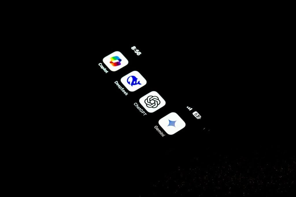 A cell phone that is lit up in the dark