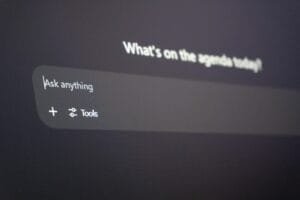 Digital interface with "ask anything" prompt.