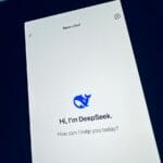 A cell phone with a text message on the screen