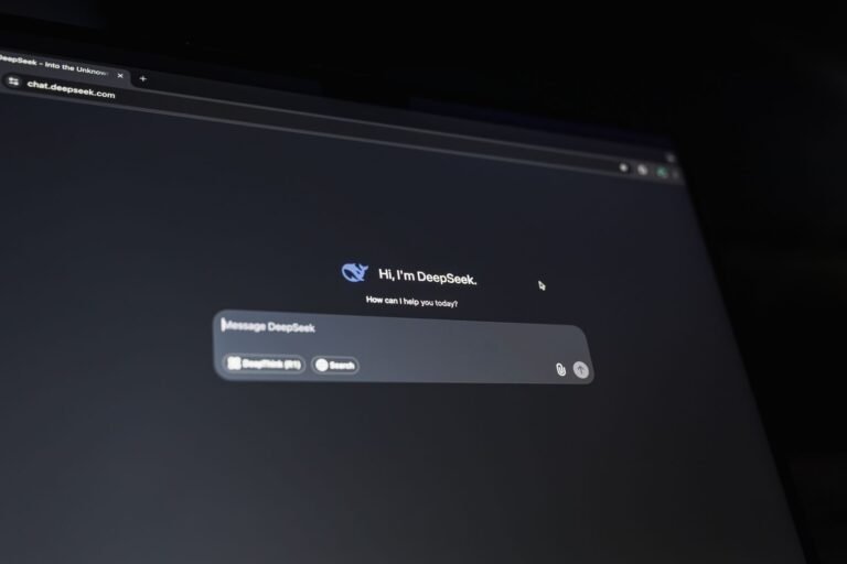 A Dark-Themed Chat Interface Displaying An Ai Assistant Conversation Starter On A Screen.