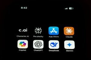 A Close Up Of A Cell Phone With Icons On It