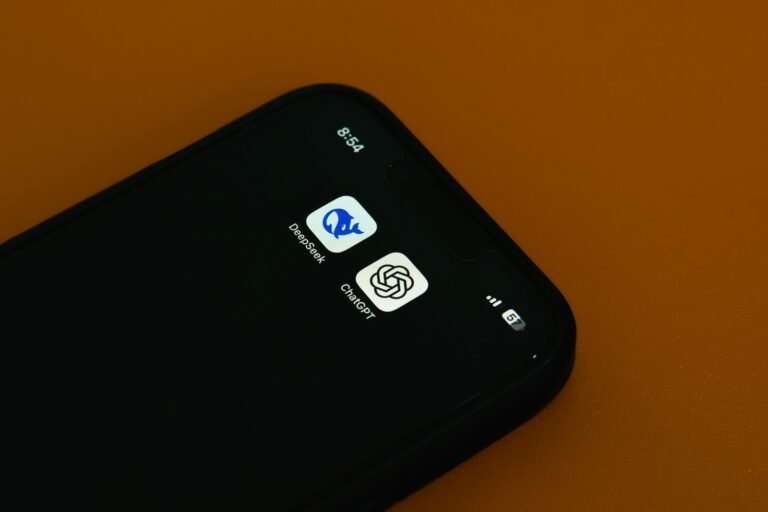 A Close Up Of A Cell Phone On A Table