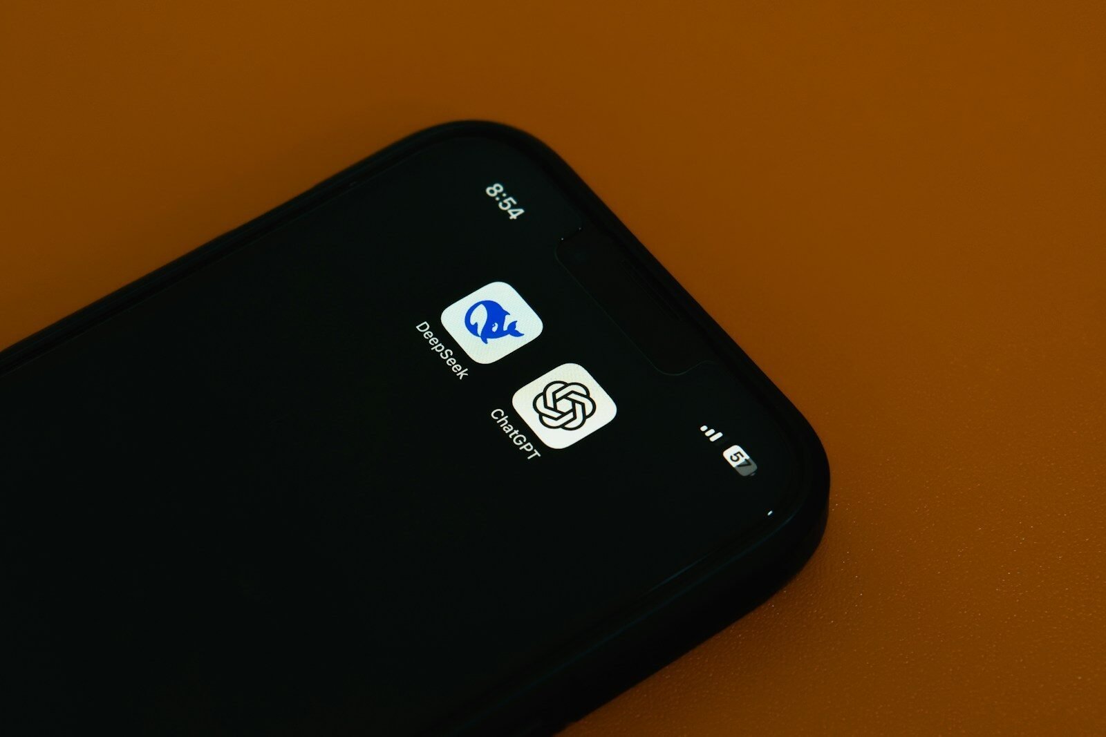 A close up of a cell phone on a table