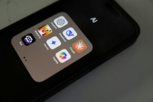 A Close Up Of A Cell Phone On A Table